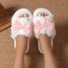 White Slippers with a Bow Design