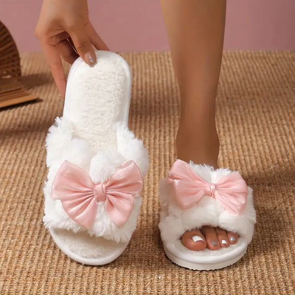 White Slippers with a Bow Design